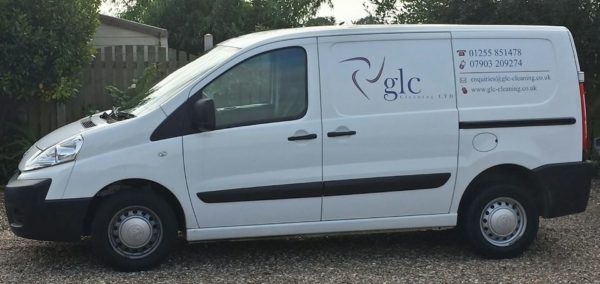 Vacuum cleaner on wooden floor

