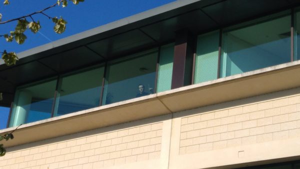 Vacuum cleaner on wooden floor

