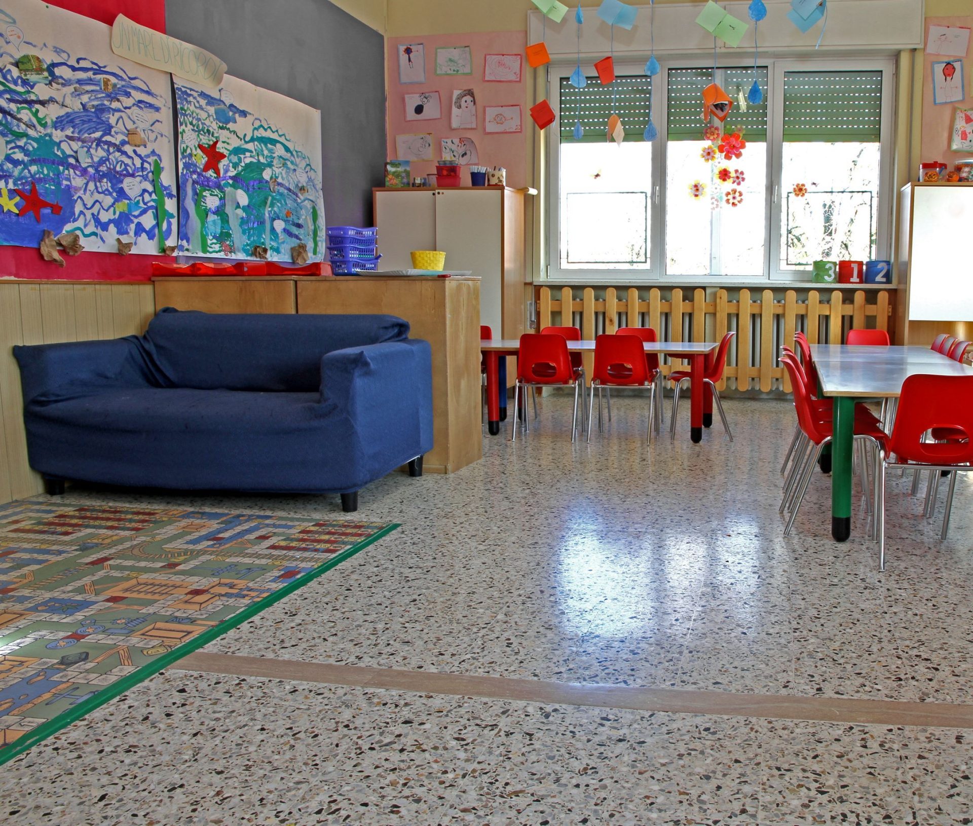 Vacuum cleaner on wooden floor

